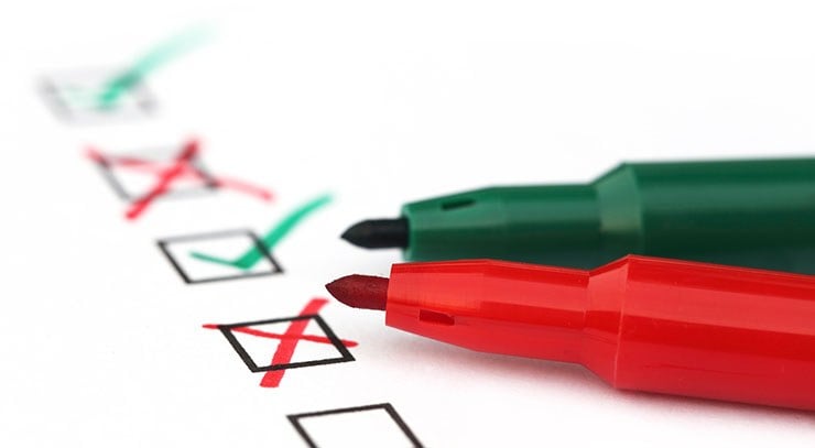 Check list with green and red pen | MemberPress